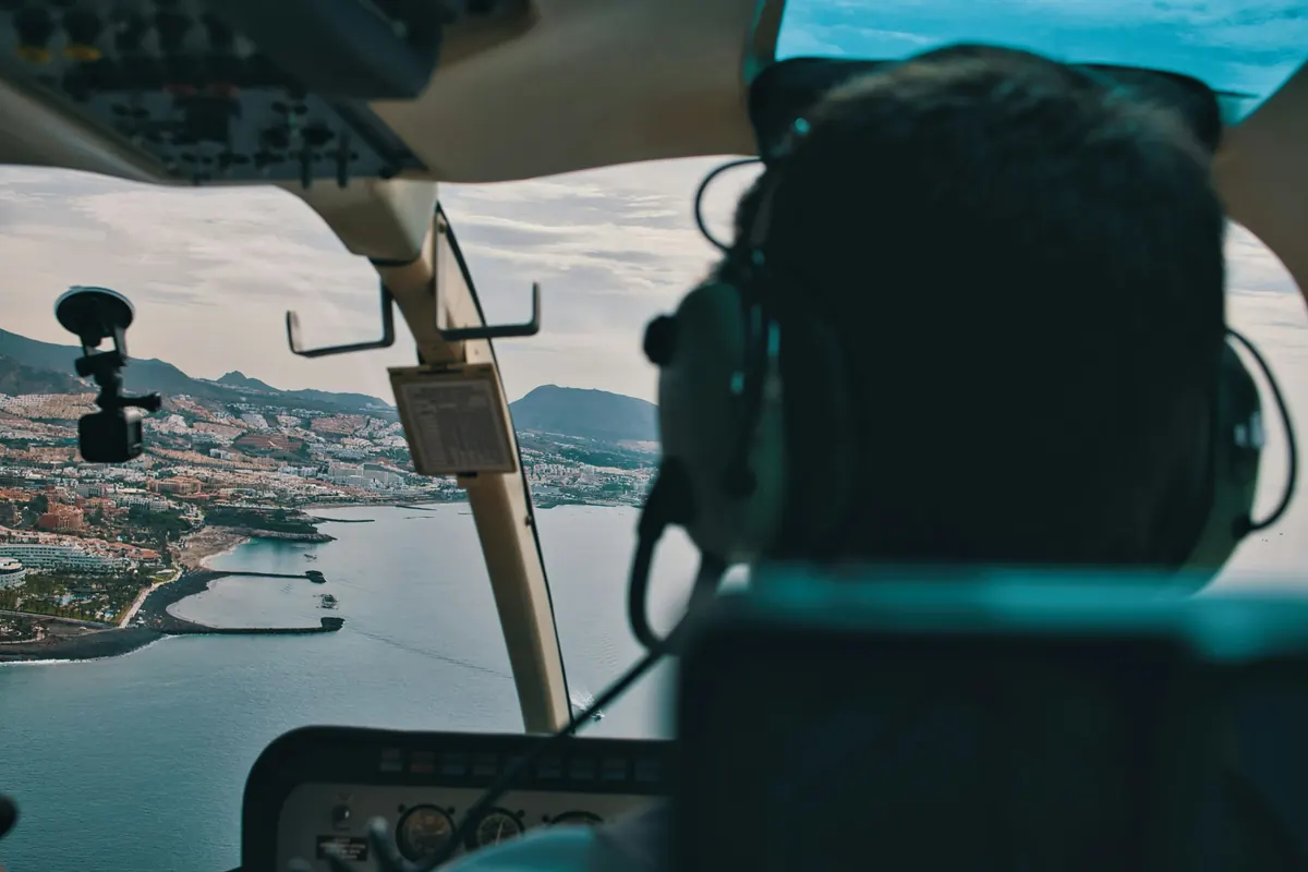 The coastline seen through a helicopter windshield