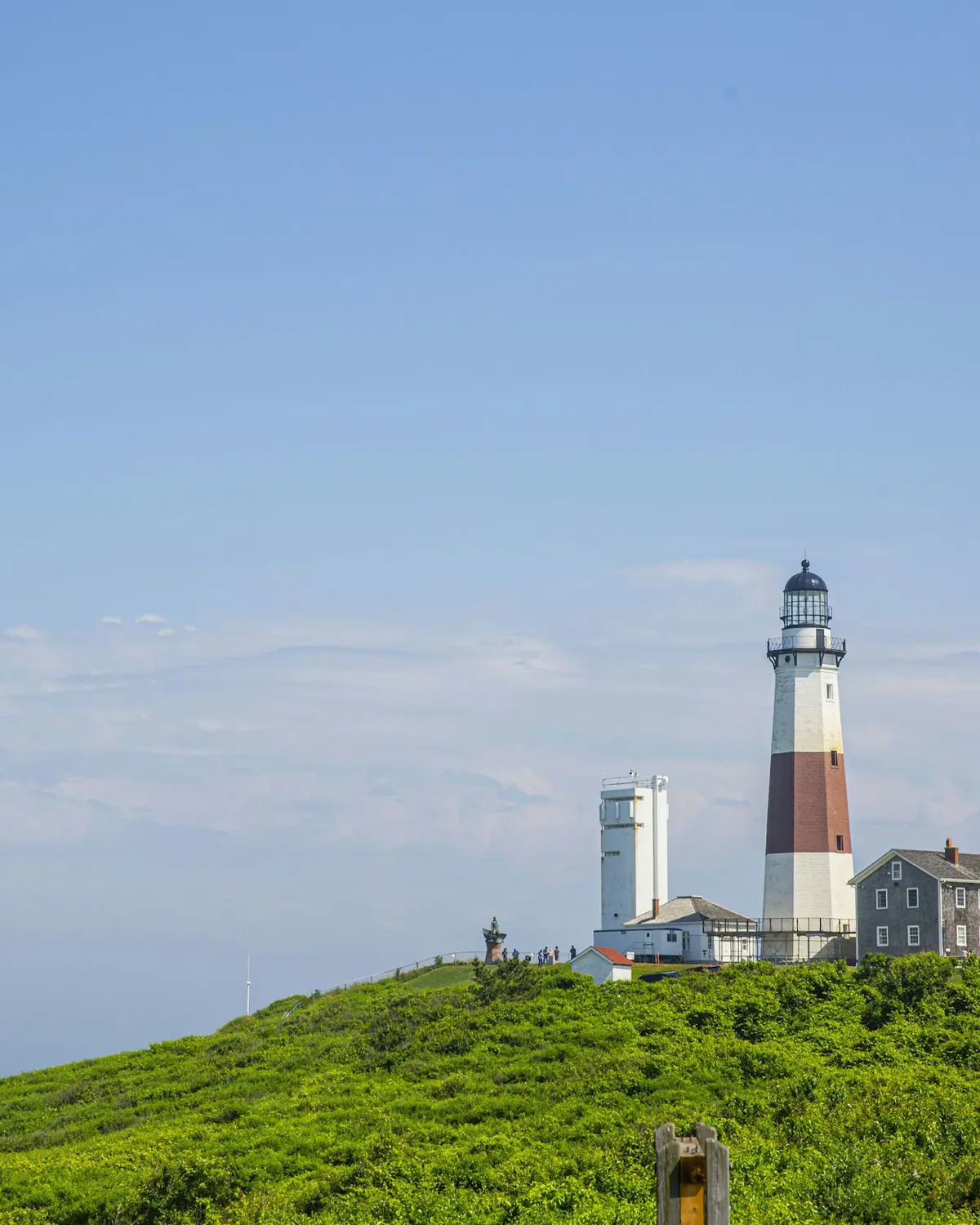 The Montauk Point lighthouse on its green bluff